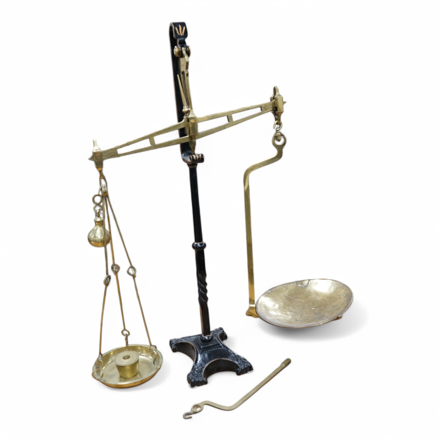 A brass Beam scale, on cast iron stand, W & T Avery, 95cm high. Condition - fair